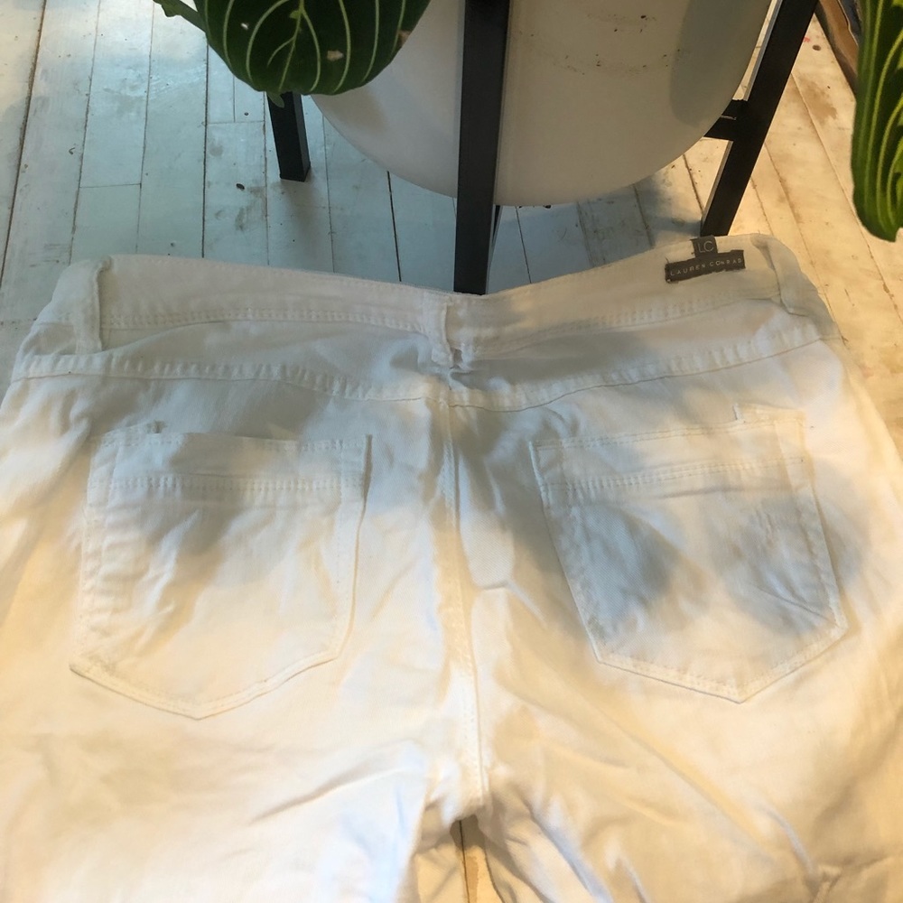 Lauren Conrad white skinny jeans with holes